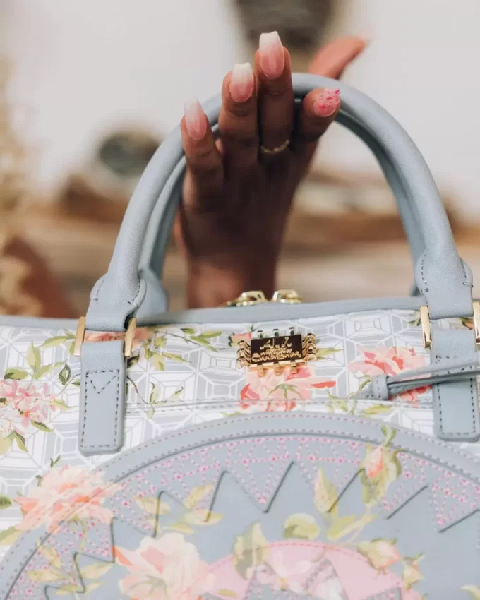 A.I. AFRICAN INTELLIGENCE ELEGANT ENERGY MINI DUFFLE – SANDBLOWER COLLAB