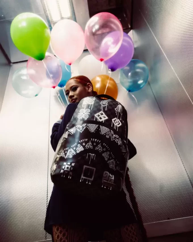 AFRIKANISCHE INTELLIGENZ 9 POWER GLYPHICS RUCKSACK – SANDFLOWER COLLAB