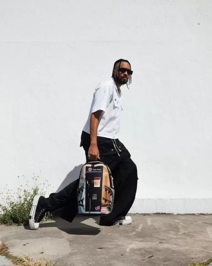 EXIT NYC PAYPHONE-RUCKSACK