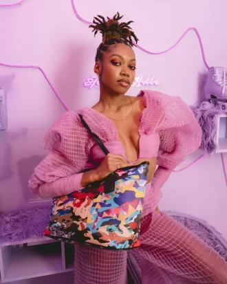 GEZEICHNETE UND GEWÜRFELTE TARISCHENTASCHE