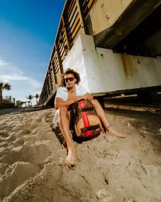 HENNY VICTORY LAP SKATEBOARD-GURT-RUCKSACK