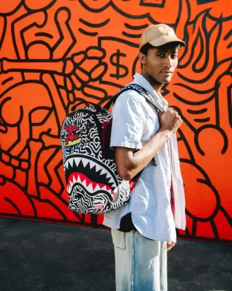KEITH HARING SKATER SHARK DLXSR RUCKSACK