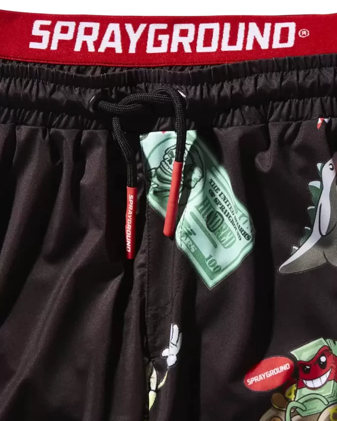 Kinder-Badehose mit Aufnähern (schwarz)